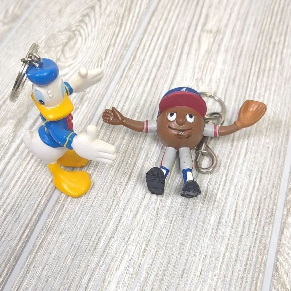Vintage Lot of 7 Assorted Keychain Figures Disney Looney Tunes NFL Mickey Mouse